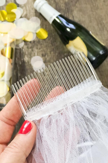 Velo de despedida de soltera de mariposa retro de los años 90