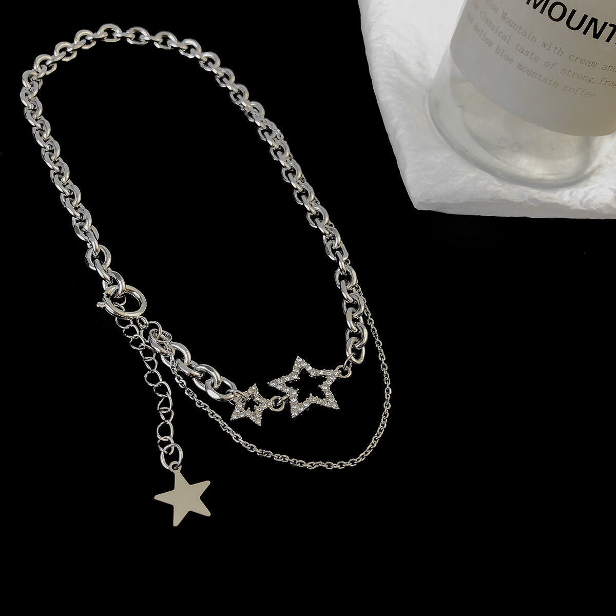 Collar con dijes de estrellas