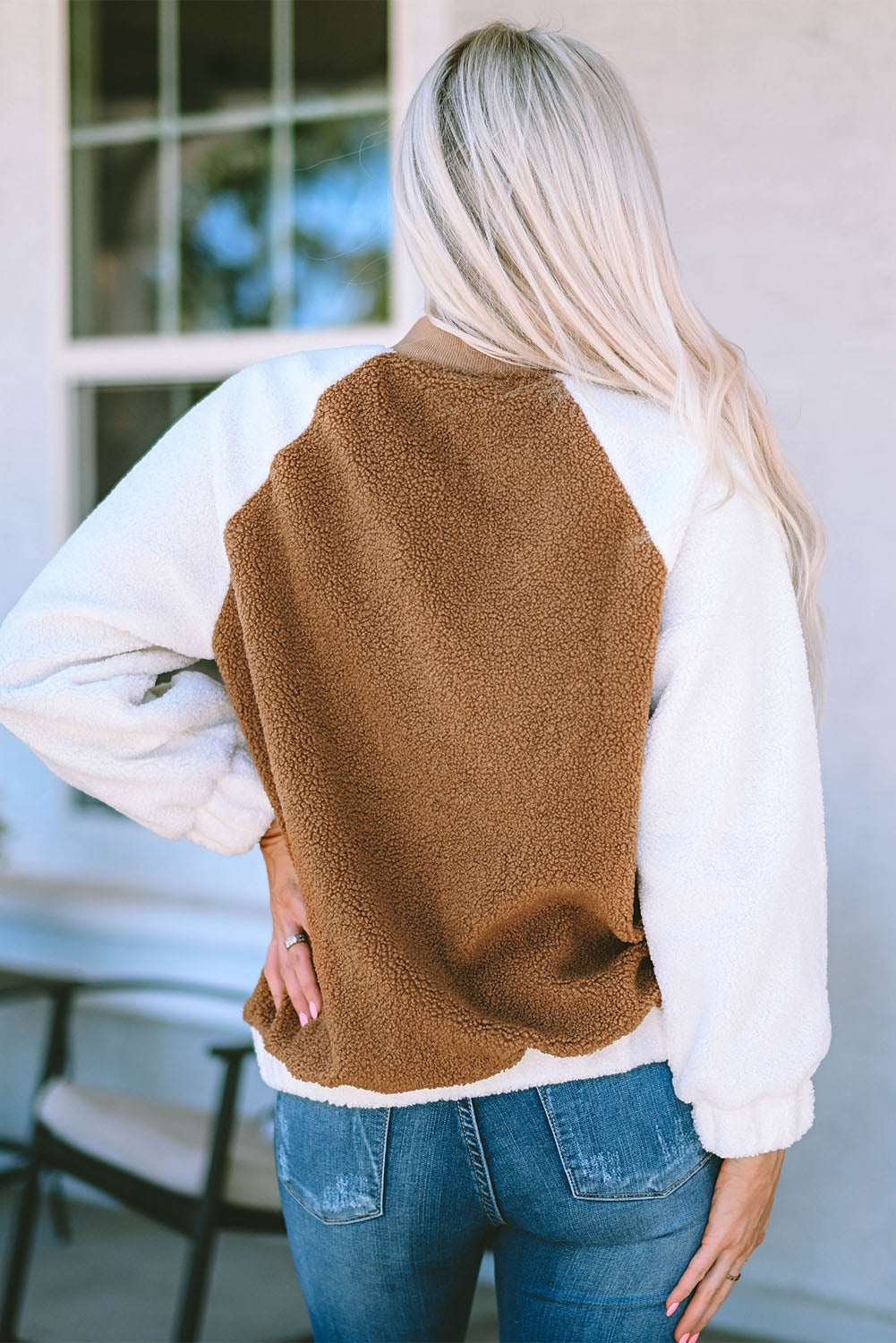 Chaqueta con mangas raglán a presión